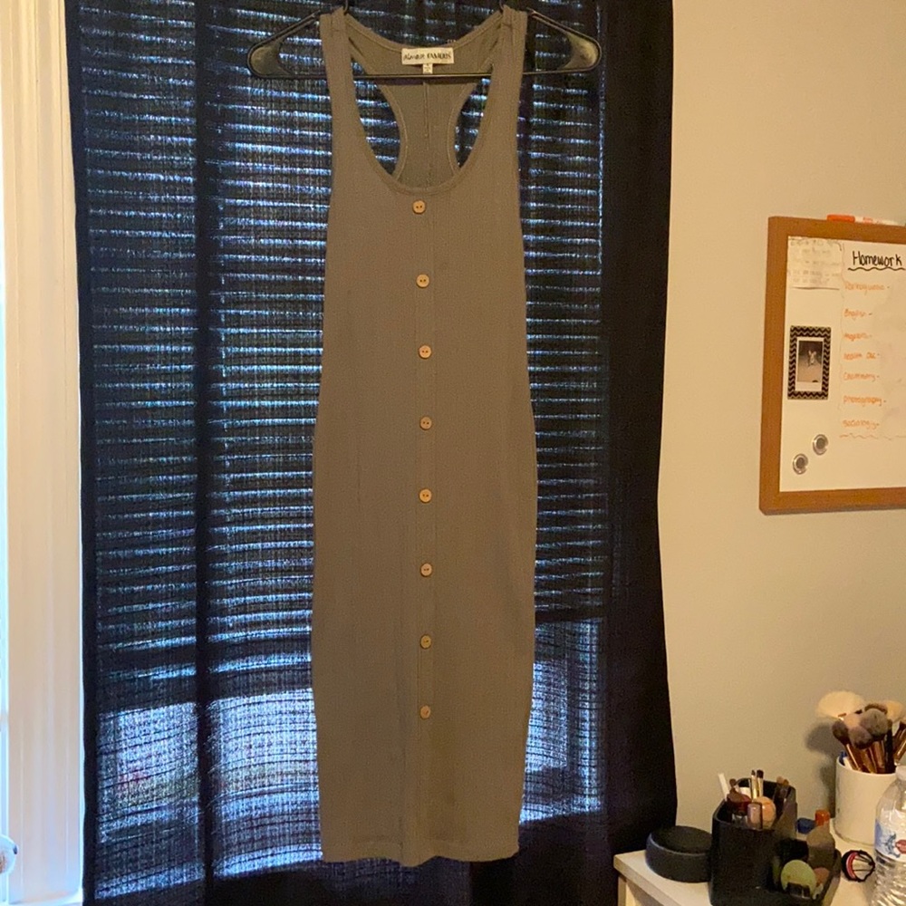 Long fitted buttoned down dress.
